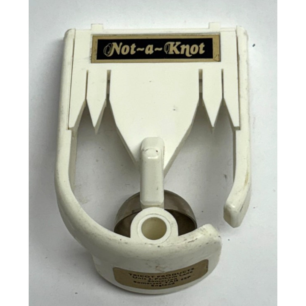 Vintage NOT -A- KNOT DOOR KNOCKER VINTAGE STYLE WHITE PLASTIC AND METAL KNOCKER
