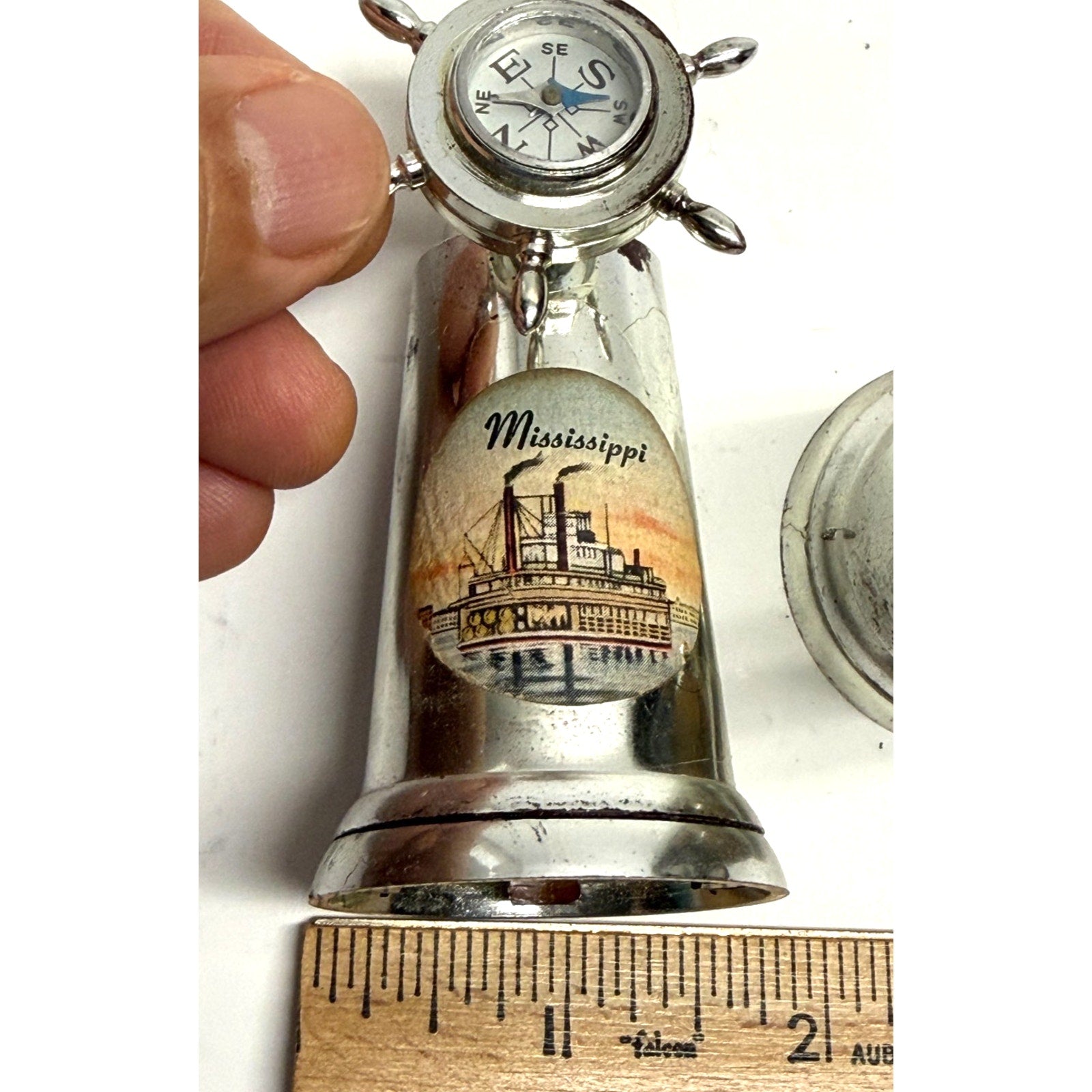 Vintage Mississippi salt, pepper shakers with compass