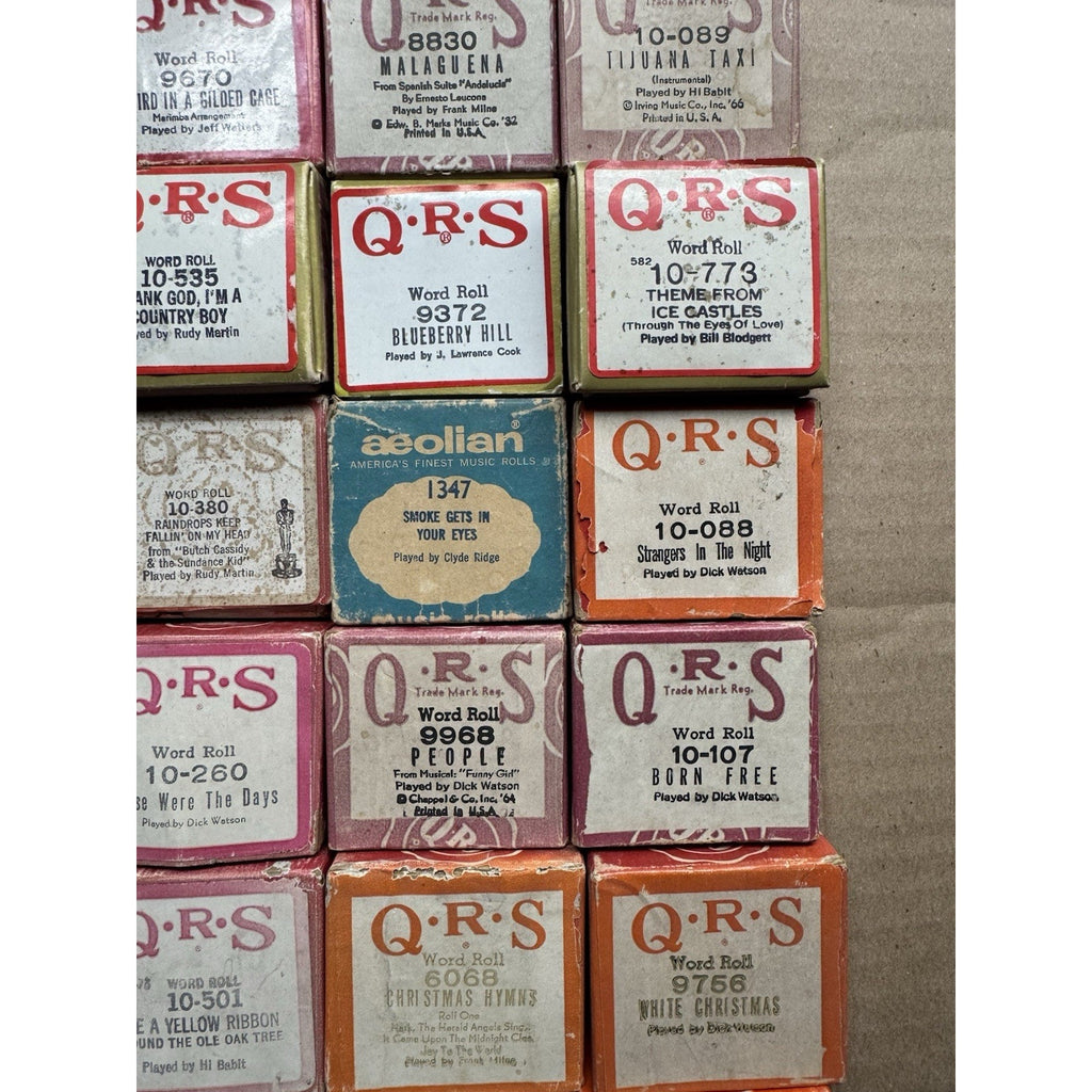 VINTAGE QRS WORD ROLL PIANO PLAYER MUSIC ROLLS LOT OF 34 ROLLS MELODEE SONGS