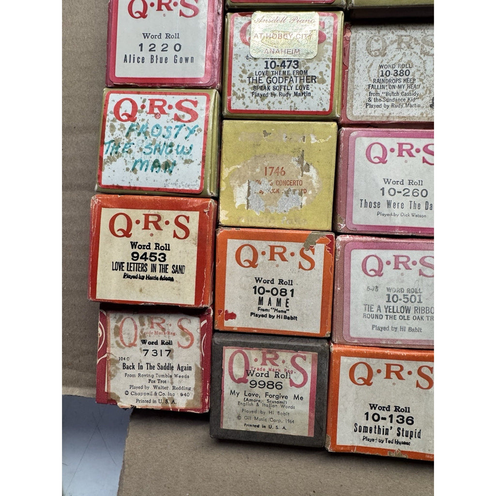 VINTAGE QRS WORD ROLL PIANO PLAYER MUSIC ROLLS LOT OF 34 ROLLS MELODEE SONGS