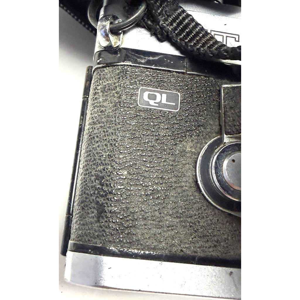 Vintage Canon FT QL 35mm SLR Film Camera with FL 35mm f2.5 Lens