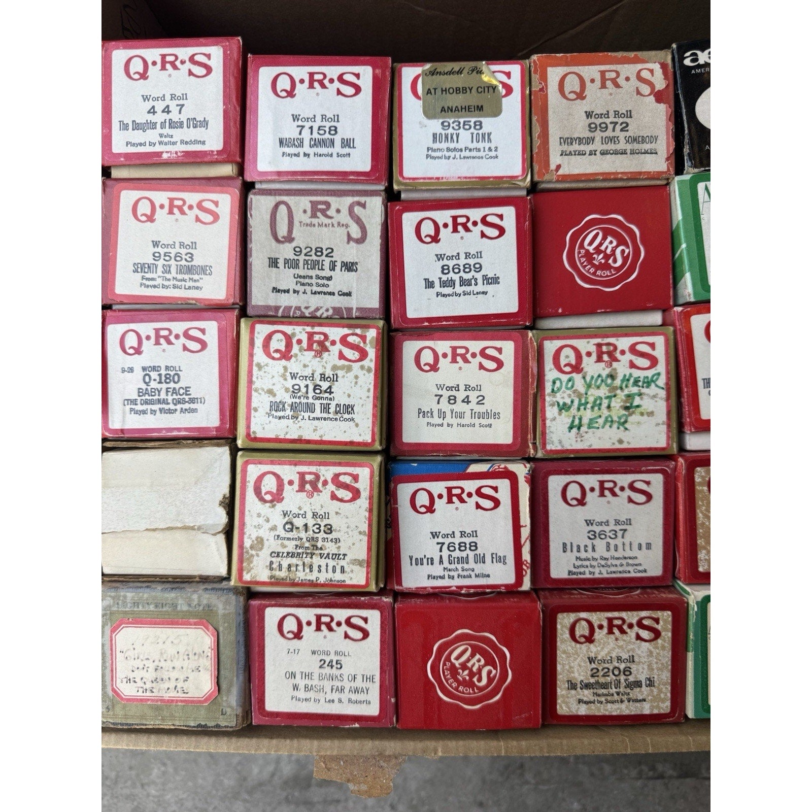 VINTAGE QRS WORD ROLL PIANO PLAYER MUSIC ROLLS LOT OF 35 ROLLS MELODEE SONGS
