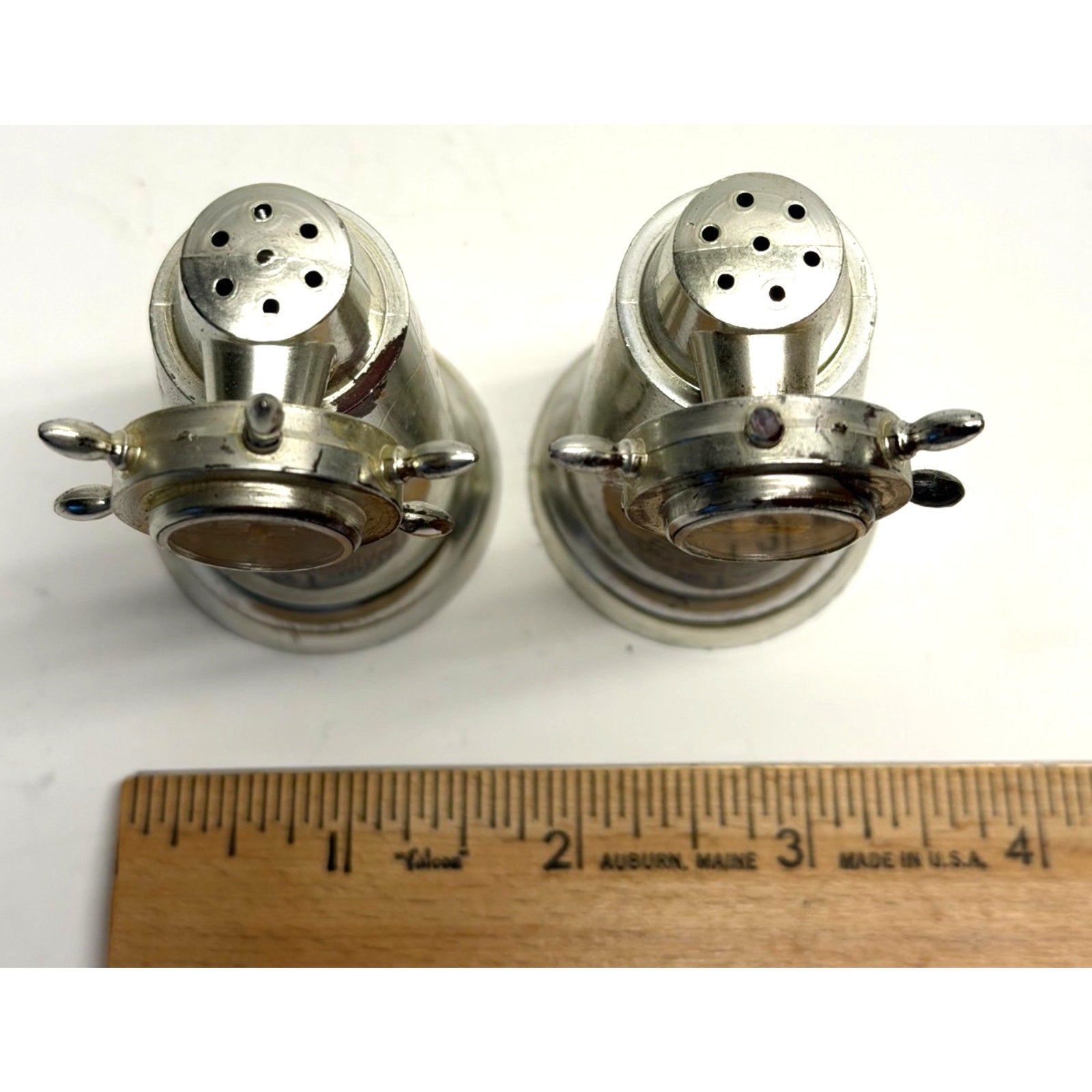 Vintage Mississippi salt, pepper shakers with compass