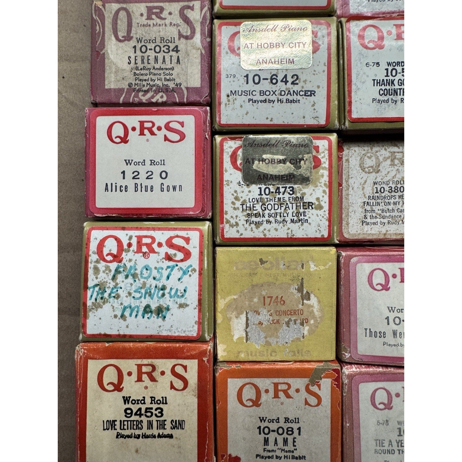 VINTAGE QRS WORD ROLL PIANO PLAYER MUSIC ROLLS LOT OF 34 ROLLS MELODEE SONGS